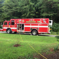 WVFC Rescue 1 outside on wooded road